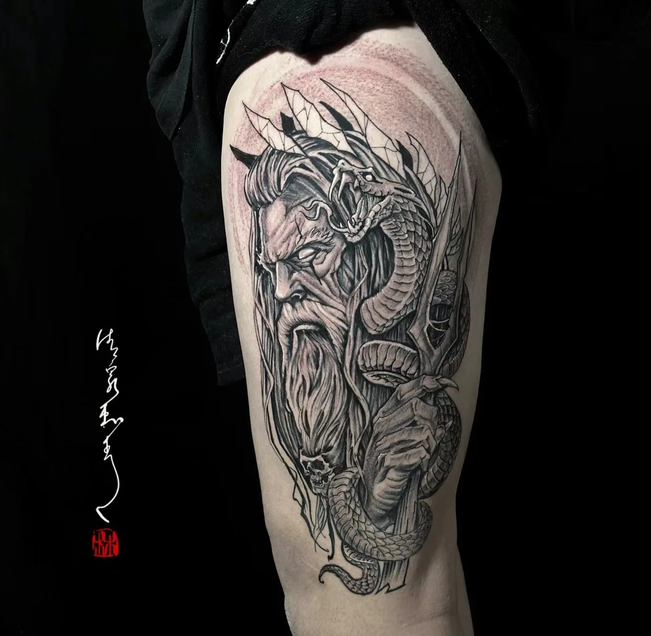 Black-and-grey horned warrior and serpent thigh piece